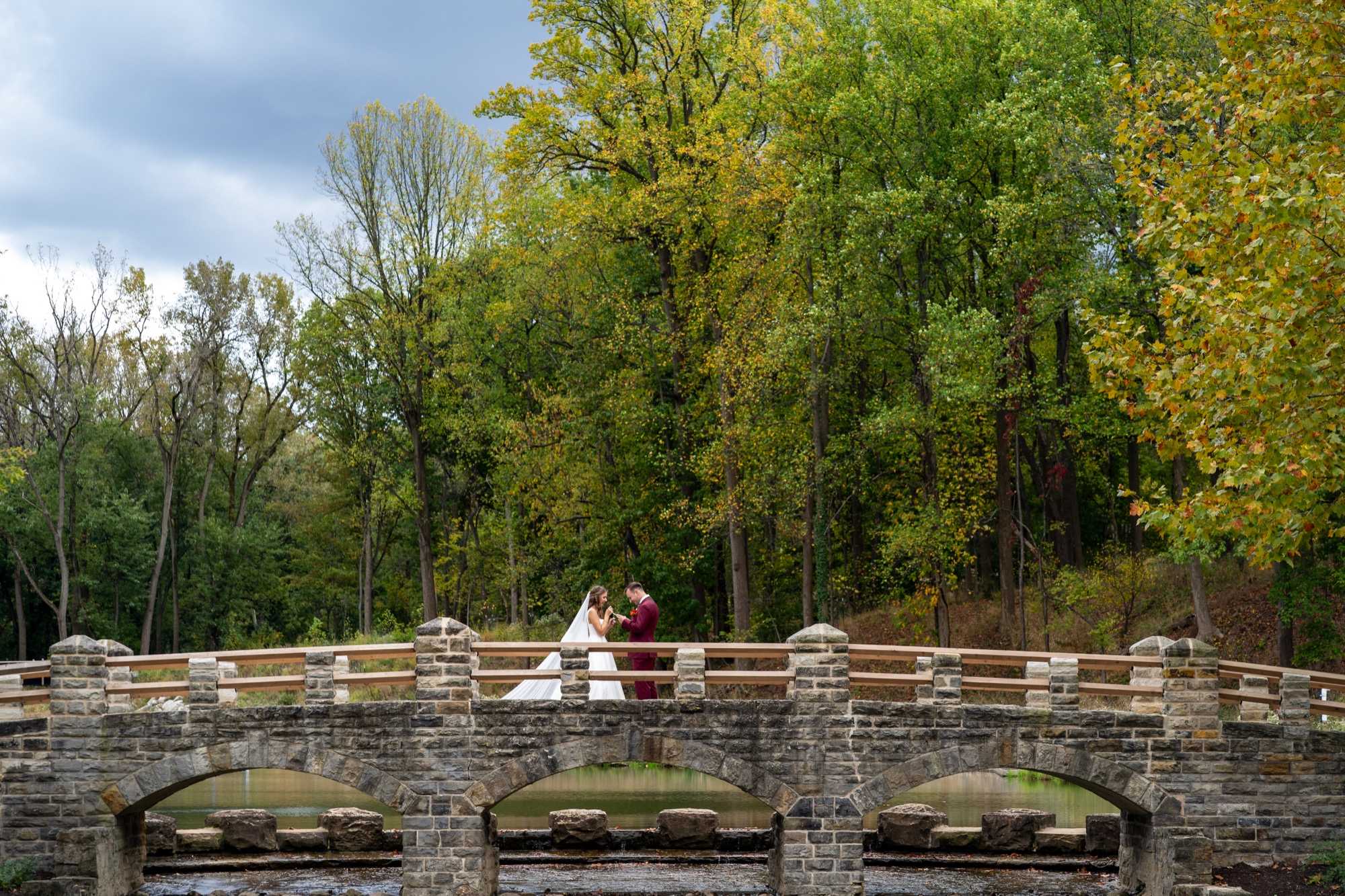 Wedding couple portrait on a bridge